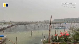 Hailstorms and heavy rain batter China’s Jiangsu province