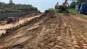Укрепление откоса шпунтом ПВХ и грунта георешеткой в КП Большой берег