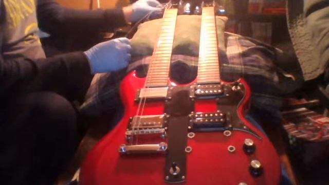 Re-Stringing an 18-string double neck guitar смотреть онлайн