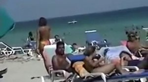 Topless Girl On Beach