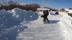 На мопеде Alpha зимой по снегу в -20