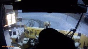 Volvo L90F loader with 12-24 Metal Pless plowing snow