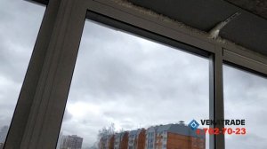 Остекление Г образного балкона раздвижными окнами Г