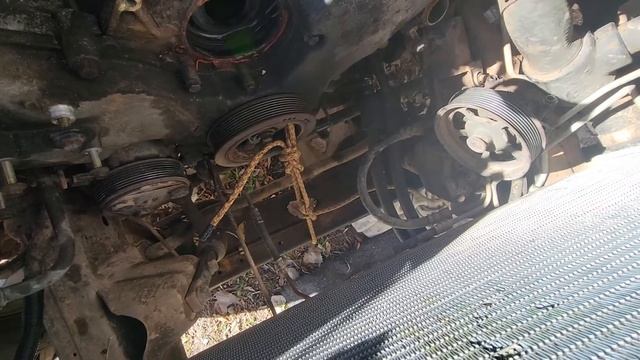 How to free a 1997 Ford F-150 4.6l crankshaft pulley without an air tool.