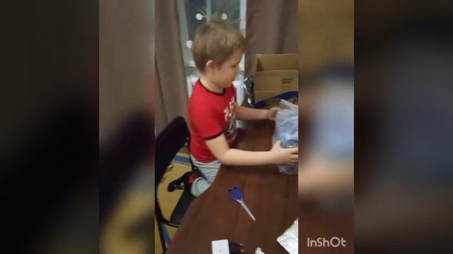 Распаковка игрушки из Китая. Акула