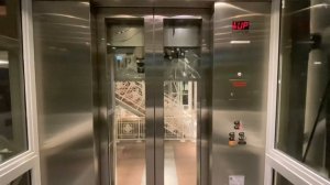 Otis Hydraulic Scenic Elevators - Aon Center - Chicago, IL