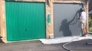 Spray painting a garage door