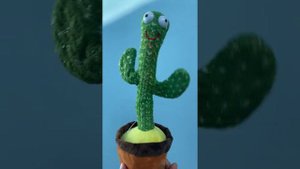 Танцующий кактус игрушка. Музыкальный кактус. С неоновой подсветкой и повторением слов..