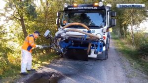 Германия ремонтируют дороги(ямочный ремонт).