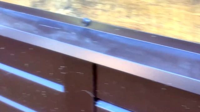 Отделка цоколя.  Металлосайдинг L-Брус на забивные сваи.