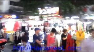 Night market of inexpensive clothes, shoes and souvenirs in Sanya, Hainan, China   where to buy che