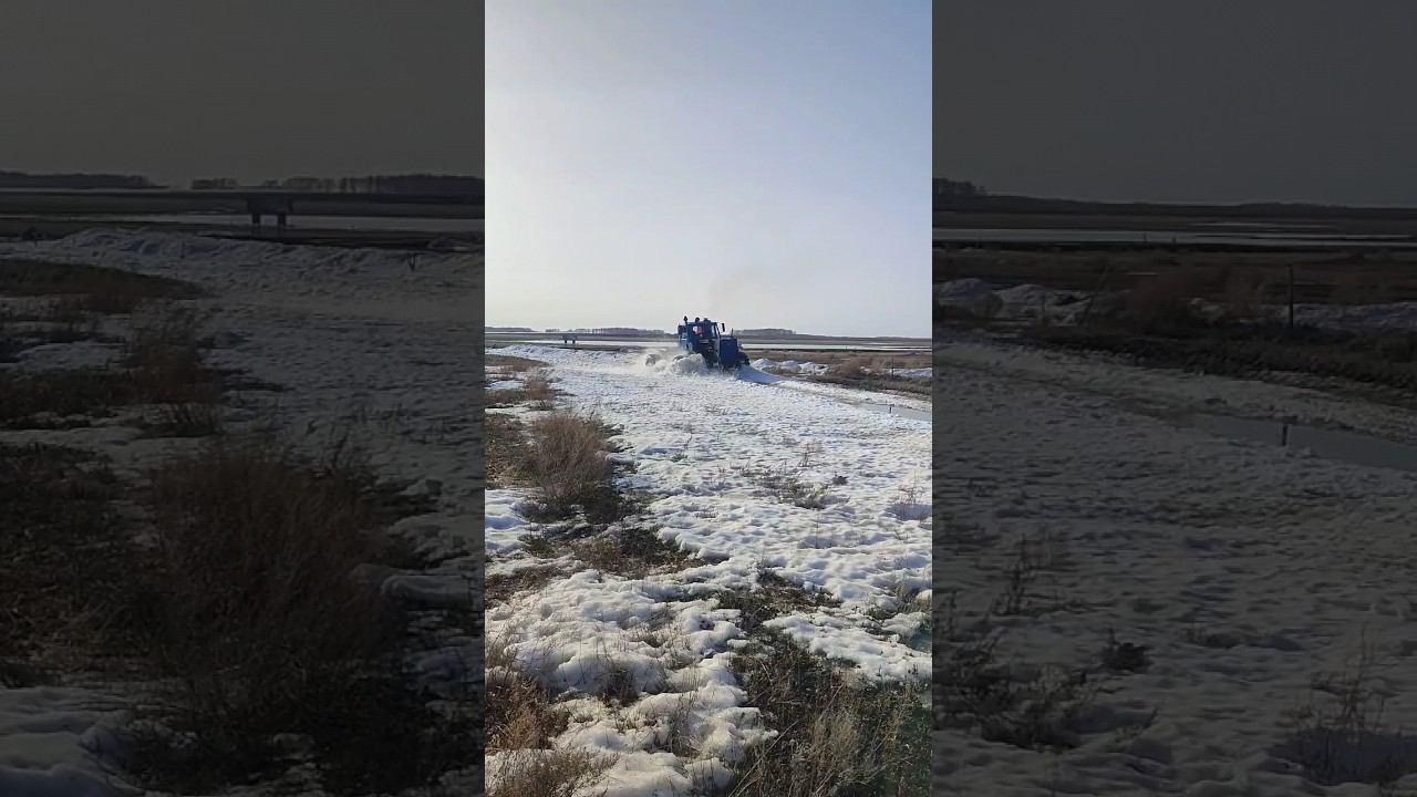 ХТЗ Т-150к разбивает снег смотреть онлайн