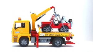 Эвакуатор MAN с портативным краном и внедорожником, 02-750 02750 Bruder Спецтехника