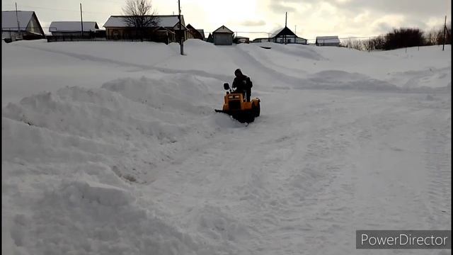 Минитрактор с поворотным отвалом. смотреть онлайн