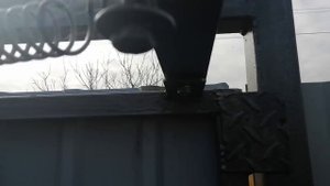 Доводчик на калитку из пружины.