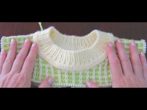 Росток, связанный от середины спинки при круговом вязании.