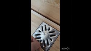 Трап в бане с деревянным проливным полом .