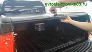 Тюнинг Toyota Hilux. Установленна Ролетта, защита бамперов, фаркоп и мультимедийная система.