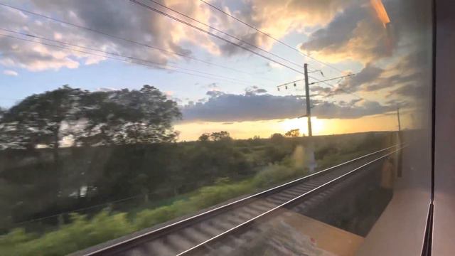 Закат над зеркалом реки Волхов из окна Сапсана в полный штиль смотреть онлайн