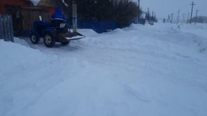 минитрактор против снега.