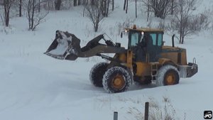 Расчистка дорог погрузчиком Mitsuber