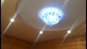 Двухуровневые натяжные потолки в деревянном доме из бруса