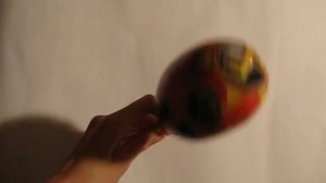 маракас maracas  зделала сама из папье-маше. made herself out of papier-mache