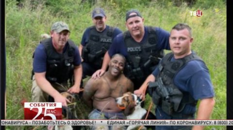 Фото улыбающихся полицейских с грабителем удивило американцев. Великий перепост