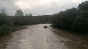 Через брод на речке Афипс в станице Крепостной.