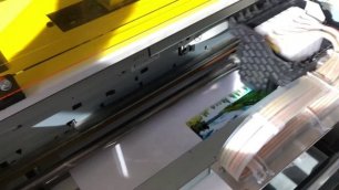 Печать на мелованной бумаге экосольвентом на принтере PrintX на планшетном БУ принтере
