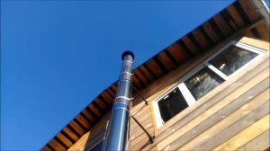 Твердотопливный котел длительного горения Космос КМВ 15.  Установлен на крыльце.  Дом 150 м2.