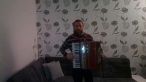 игра на аккордеоне. "Исчезли солнечные дни." "The sunny days are gone."