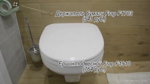 Ванная комната с душ поддоном из плитки и стеклянными перегородками.
