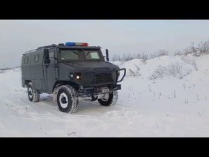 Бронеавтомобиль с нанесенной мастикой "АнтиТон"