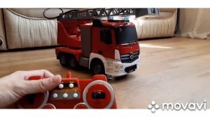 Обзор Игрушка Пожарная машина со звуком, светом и водой. Double E