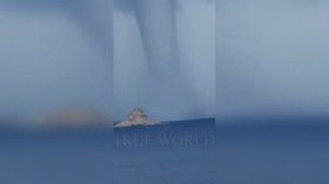 Incredible footage! A huge water tornado hit the coast of Corsica in France!