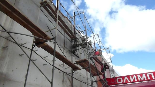 Алмазная канатная резка проемов в кирпичной стене на ТЦ Олимп смотреть онлайн