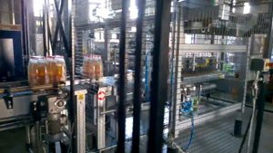 Линия упаковки напитков: групповая упаковка в термоусадочную плёнку, паллетирование и обмотка