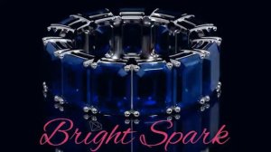 Золотое кольцо с сапфирами изумрудной огранки по кругу Holly 13 каратот Bright Spark