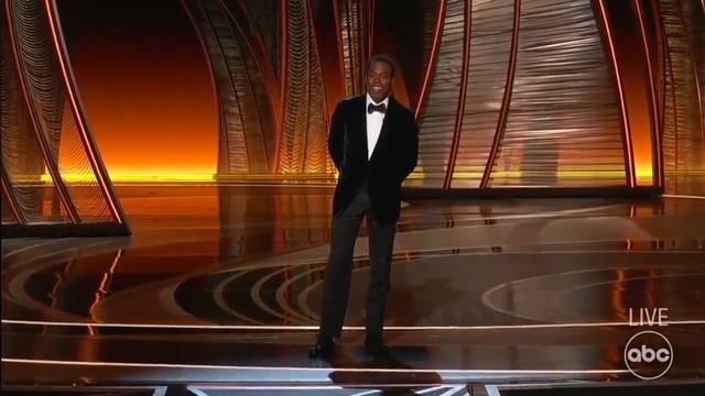 Will Smith punches Chris Rock after he jokes about his wife