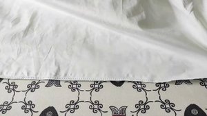 Часть видеоурока по пошиву постельного белья