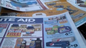 CША..Газеты в пакетиках..,,КУПОНОМАНИЯ,,. американская сиситема..