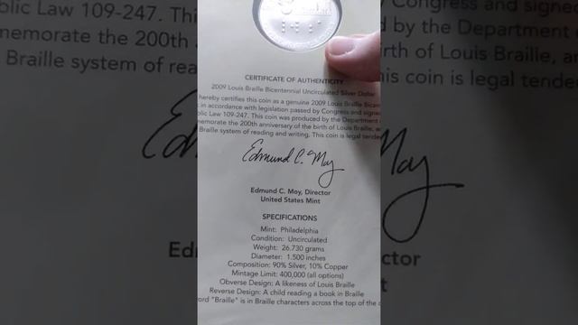 US mint produced commemorative dollar in 90% Silver for Braille writing's creator.