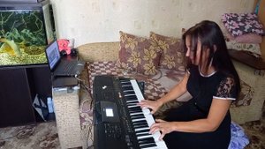 "Кукла колдуна" на пианино.