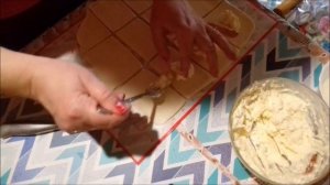 Печенье из слоеного теста , с творожной начинкой .
