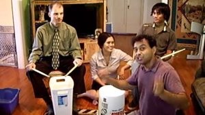 Learning Percussion, making buckets and cans sound like a drum set