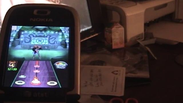 Guitar Hero World Tour Mobile смотреть онлайн