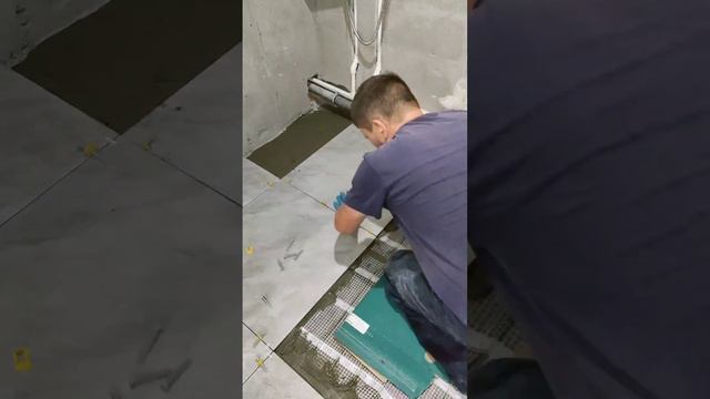 Укладка плитки на теплый пол.