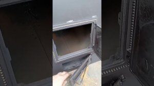 печь для бани с открытой каменкой и топкой из предбанника.
