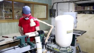 Компактный стружкоотсос Record Power CX 2000 для небольшой мастерской.